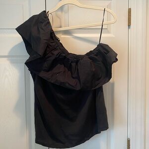 We wore what, Black one shoulder top